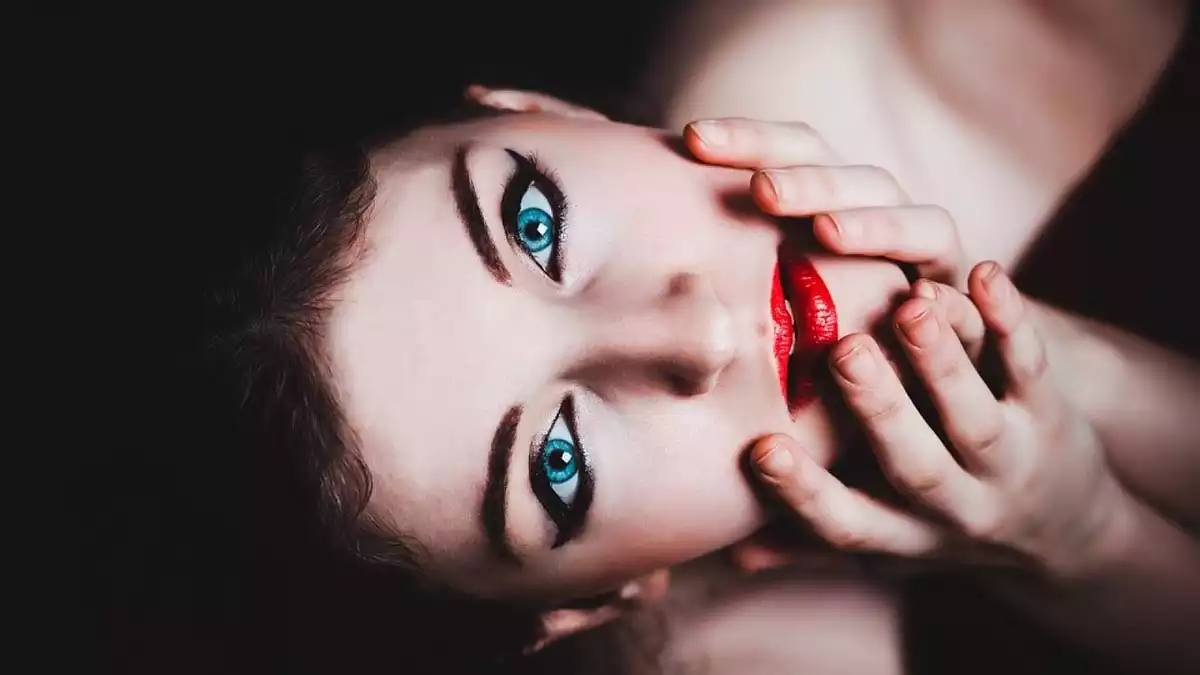 blue eyed woman with red lips