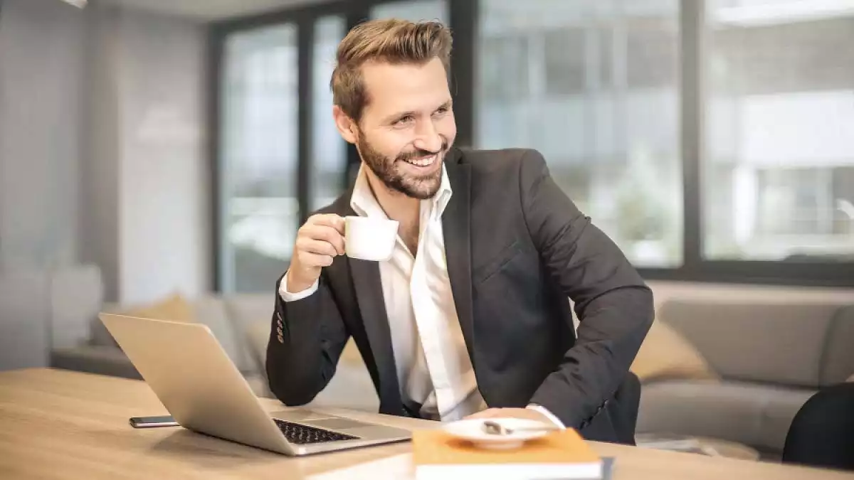 Man having coffee at work