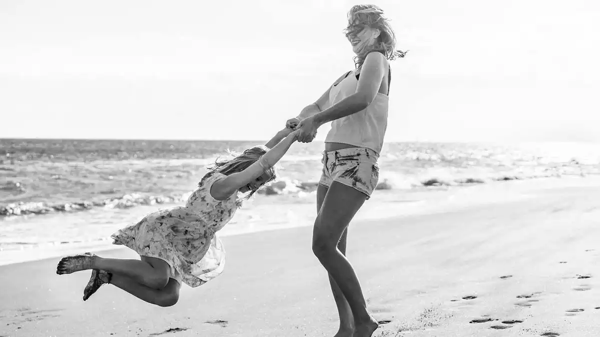 Mother and daughter at the beach