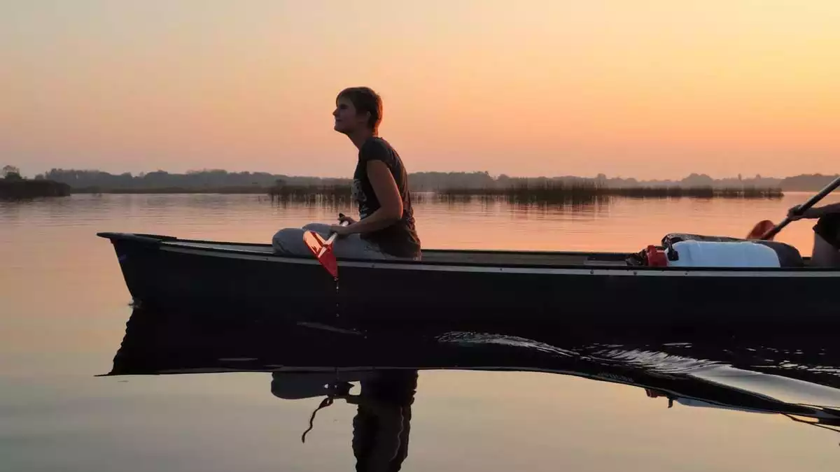 Woman sitting on a boat.