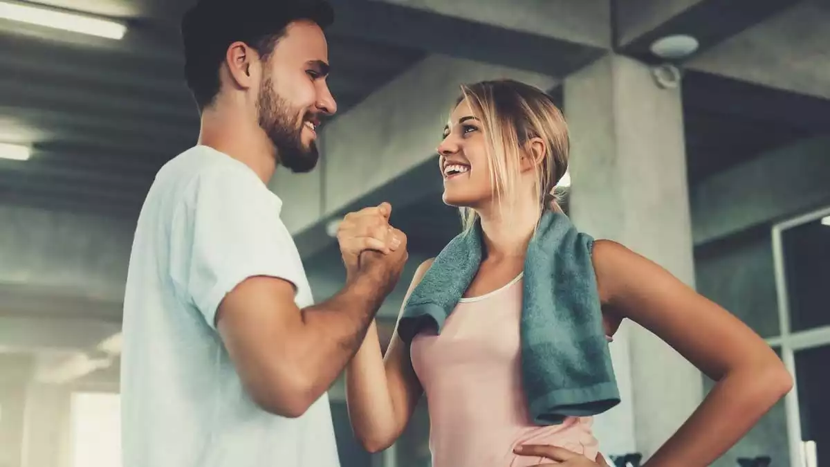 A man and woman in the gym.