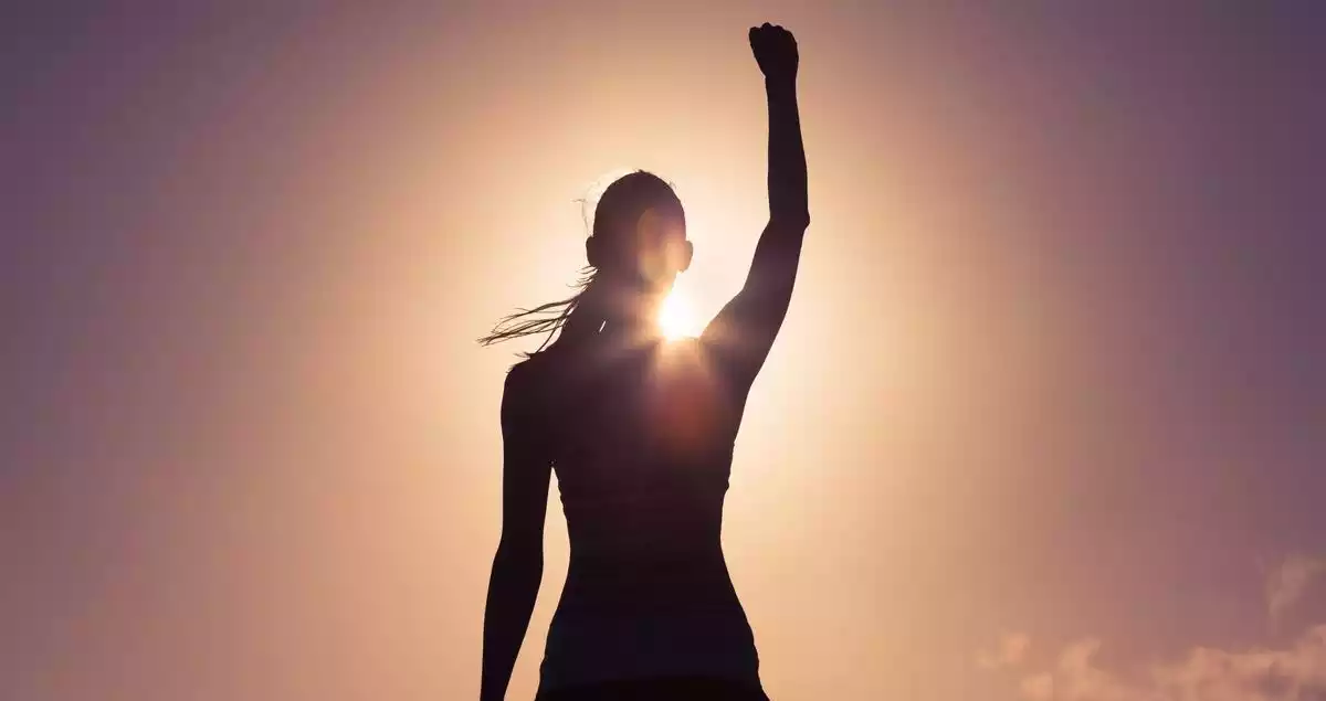 A woman lifting her fist