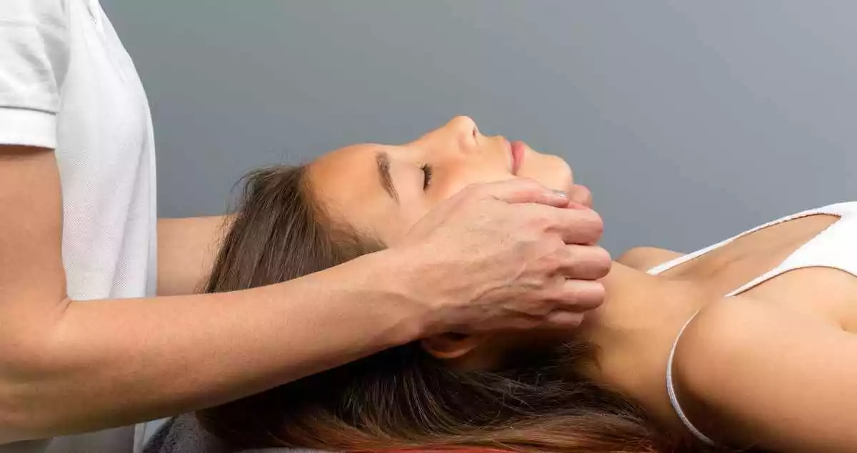 A woman lying down read for a massage