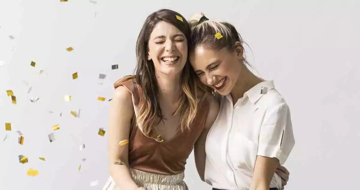 two girls laughing