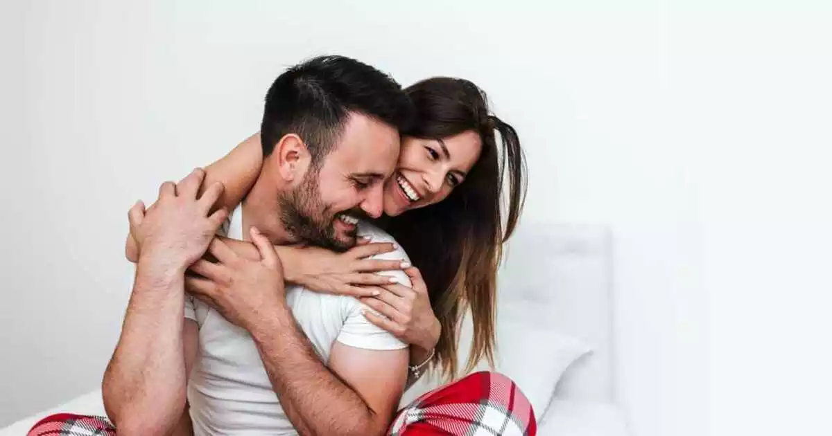 A man and a woman hugging each other