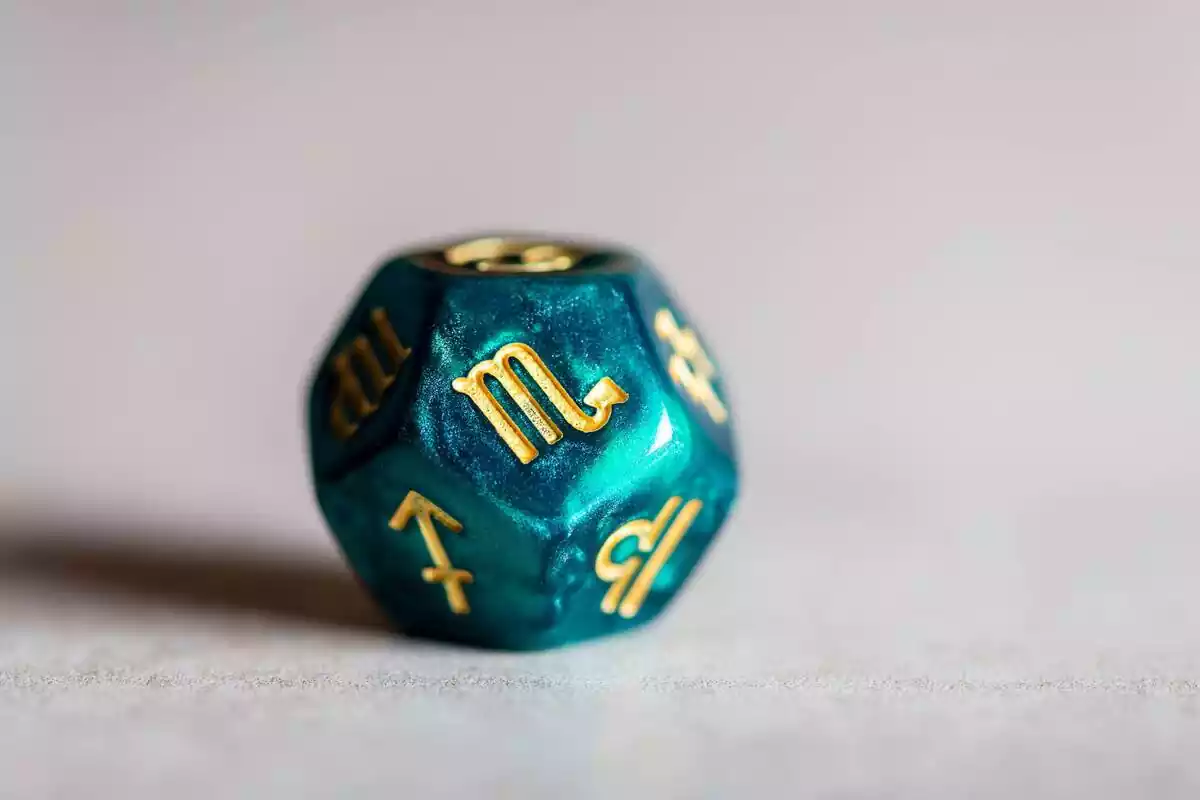 Astrology dice with zodiac symbol Scorpio